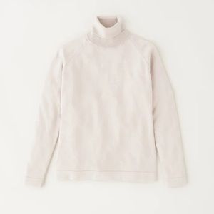 Fine knit turtleneck sweater by Kotn